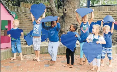  ?? Picture: FREDLIN ADRIAAN ?? BLUE CREW: Young Siembamba charges, from left, Marnitz van Rooyen, 3, Logan van der Walt, 5, Avethandwa Funde, 3, Minentle MayiMayi, 3, Lia Lodewyks, 3, Lacey van Rensburg, 4, and FJ Goosen, 4, support the Blue Heart Day challenge