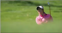  ?? Canadian Press photo ?? Marina Alex, from the United States, hits an approach shot on the third hole during first-round play at the Canadian Pacific Women's Open in Ottawa, Thursday.