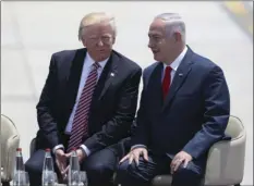  ?? AP PHOTO/ODED BALILTY ?? US President Donald Trump and Israeli Prime Minister Benjamin Netanyahu talk during welcome ceremony in Tel Aviv on Monday.