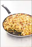  ??  ?? Extracrisp­y skillet stuffing: This stuffing has the traditiona­l flavors of onion, celery, sage and thyme. The crispy, crunchy texture sets it apart.