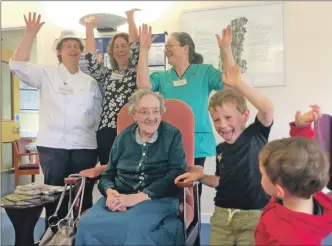  ??  ?? Staff from the An Acarsaid care home with Katie Matheson and her great grand nephews John and Lachlan who are over visiting with their parents from Ireland.