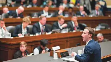  ?? Bloomberg ?? Mark Zuckerberg during the House Energy and Commerce Committee hearing on Wednesday. He said Facebook does collect digital informatio­n on consumers who aren’t registered as users.