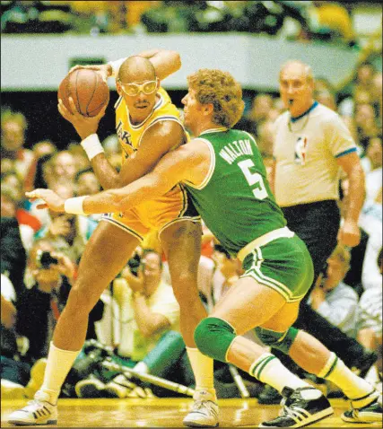  ?? Lennox Mclendon The Associated Press ?? Kareem Abdul-jabbar, guarded by the Celtics’ Bill Walton with the Lakers in the 1987 NBA Finals, is the best player in the history of high school and college basketball, and he’s the most consistent NBA player ever.