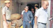  ?? PTI ?? NIA officials conduct raids at the Khari Baoli wholesale market in Old Delhi on Wednesday as part of its terrorfund­ing probe.