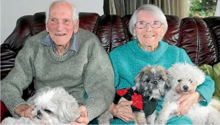  ??  ?? Ken and Pearl Coatsworth with their dogs Shishi, Zoe and Sadie.