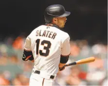  ?? Ezra Shaw / Getty Images ?? Austin Slater rips a fifthinnin­g double to give the Giants a 10 lead. He later scored on a fielder’schoice grounder.