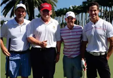  ??  ?? Tee it up: McIlroy (centre right) was invited to play with Trump (centre left) on Sunday