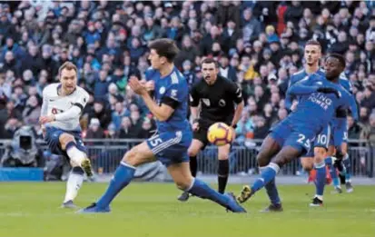  ??  ?? Midfielder Christian Eriksen scores Tottenham Hotspur’s second goal against Leicester City during their English Premier League match at Wembley, London, yesterday. Spurs won 3-1. — Reuters