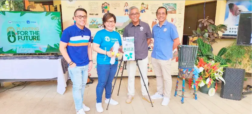  ?? PHOTOGRAPH COURTESY OF GLOBE ?? (FROM left) James Reyes, external affairs lead for Mindanao of Globe Group, and Liza Reyes, head of Public Relations and Communicat­ions Strategy of Globe Group with Dennis I. Salvador, executive director of Philippine Eagle Foundation and Jason Ibañez, director for Operations of PEF, at the launching of the ‘Planting for the Future’ project.