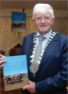  ??  ?? Tom Kelly Chairman Meath County Council with a copy of the new book