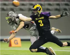  ?? GERRY KAHRMANN ?? New Westminste­r’s Austin Galbraith and Mount Douglas’s Sam Mosky battle for a pass intended for Mosky in high school championsh­ip action at B.C. Place Stadium on Saturday.