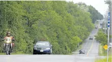  ?? CLIFFORD SKARSTEDT/EXAMINER ?? A view of Parkhill Rd. W. looking east at the intersecti­on of Brealey Dr. on Friday. A plan to expropriat­e land to widen the road and add a roundabout at the intersecti­on is up for approval at Monday’s city council meeting.