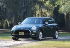  ?? MARK RICHARDSON FOR THE TORONTO STAR ?? This Mini Cooper is painted British Racing Green, which is a $590 option.