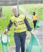  ??  ?? All smiles Ferguslie Community Council members doing their bit