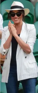  ??  ?? Smart: Meghan at Wimbledon