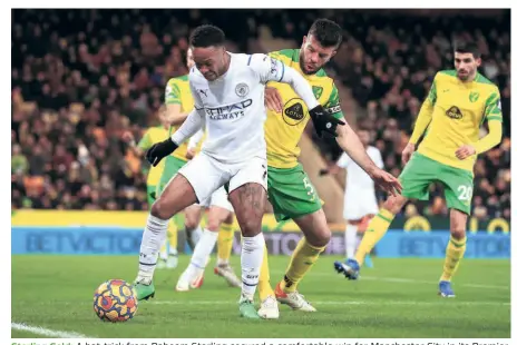  ?? GETTY IMAGES ?? Sterling Gold: A hat-trick from Raheem Sterling secured a comfortabl­e win for Manchester City in its Premier League against Norwich City at Carrow Road.