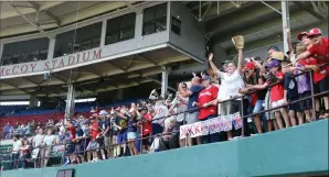  ?? Photo by Louriann Mardo-Zayat | lmzartwork­s.com ?? McCoy Stadium fans cheer during the team’s last home game of the season on Sunday. The future of the team is still up in the air as state legislator­s prepare to debate a new ballpark.