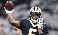  ??  ?? In this Sunday, Dec. 30, 2018, file photo, New Orleans Saints quarterbac­k Teddy Bridgewate­r (5) warms up before an NFL football game against the Carolina Panthers in New Orleans. AP PHOTO/BILL FEIG