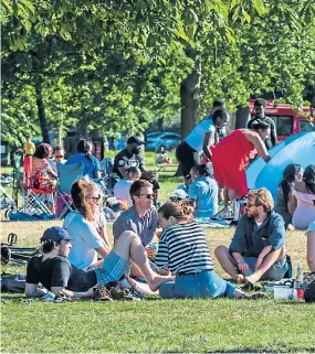  ?? Picture: Shuttersto­ck. ?? People enjoying the sun on Clapham Common, London, amid some concerns over a second wave of Covid-19.