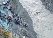  ?? — PTI ?? Rescue operations underway near Dhauligang­a hydropower project on Sunday.