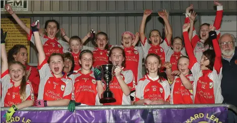 ??  ?? Gaelscoil Inis Corthaidh celebrate after accepting the trophy.