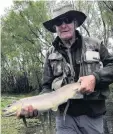  ?? PHOTO: SUPPLIED ?? The author and his prize . . . Mike Weddell with a 2kg trout from the Shag River on Sunday.