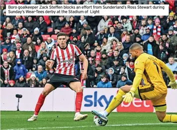  ?? ?? Boro goalkeeper Zack Steffen blocks an effort from Sunderland’s Ross Stewart during Sunday’s Wear-Tees derby at the Stadium of Light