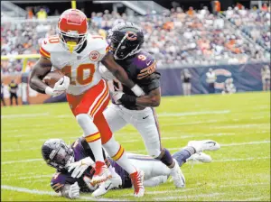  ?? David Banks
The Associated Press ?? The Kansas City Chiefs and Chicago Bears played a preseason game at Soldier Field on Saturday in poor field conditions, leading Players Associatio­n president JC Tretter to tweet an angry rebuke.