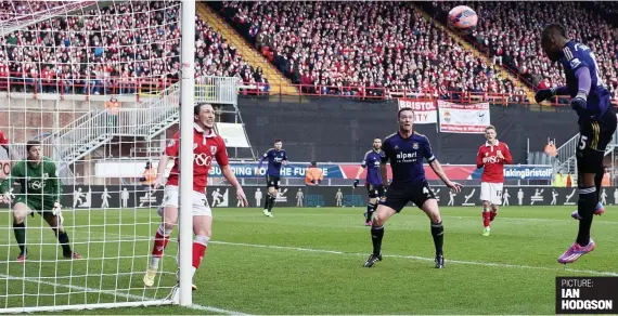  ?? PICTURE: IAN HODGSON ?? High climber: West Ham substitute Diafra Sakho finds himself unmarked at the far post and makes no mistake to head the winning goal