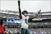  ?? RICH HUNDLEY III/ MEDIANEWS GROUP ?? Eagles wide receiver DeVonta Smith (6) celebrates after catching a touchdown against the Giants during a NFL game on Sunday afternoon at MetLife Stadium in East Rutherford.