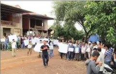  ?? SUPPLIED ?? Artisanal gold miners gather outside Mondulkiri’s Chung Phlas Commune Office to demand interventi­on to stop the Rong Chheng company’s gold mining activities.