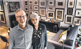  ??  ?? The Withs have packed their District of Columbia condominiu­m with framed items. “No space goes untouched,” Beverly With said.