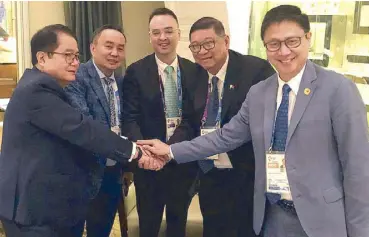  ??  ?? Foreign Affairs Secretary Alan Peter Cayetano (middle) with (from left) POC president Ricky Vargas, POC chairman Rep. Bambol Tolentino, PSC chairman Butch Ramirez and POC secretary-general Patrick Gregorio in a show of unity at the recent Asian Games.