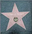  ??  ?? FALLEN STAR Trump plaque