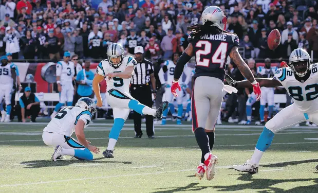  ?? JIM ROGASH / GETTY IMAGES ?? Carolina Panthers kicker Graham Gano boots a 48-yard field goal as time expires in the fourth quarter to defeat the New England Patriots 33-30 on Sunday in Foxborough, Mass. “We have a great football team,” Gano said after the game, “and I feel like we...