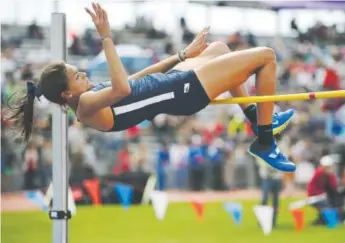  ??  ?? Valor Christian star Anna Hall competes in the Class 4A girls high jump Sunday at Jeffco Stadium. She was the runner-up, and also won two state titles in the hurdles. Helen H. Richardson, The Denver Post