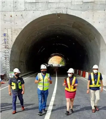  ?? (Contibuted photo) ?? WALK-THRU. Department of Public Works and Highways Secretary Mark Villar along with Subic Bay Metropolit­an Authority Chairman and Administra­tor Wilma Eisma and NLEX Corporatio­n President and General Manager J. Luigi Bautista, led a walk-thru of the new SFEX lanes built to improve traffic flow and road safety.