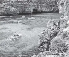  ??  ?? Clear cerulean waters lure boaters to Gozo, Malta’s tiny (and slowerpace­d) sister islet. The island nation is between Sicily and North Africa.