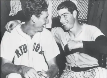  ?? ASSOCIATED PRESS ?? IN THIS JULY 8, 1941, FILE PHOTO, Joe DiMaggio, right, of the New York Yankees, congratula­tes Boston Red Sox slugger Ted Williams whose ninth inning homer defeated the national league All Stars, 7-5, in Detroit, Mich. A new film explores the life of...