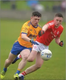  ??  ?? CTI Business Solutions IFC Group SF Dan McKeown of Kilkerley Emmets attempts to break past Ronan Bailey of St Bride’s.