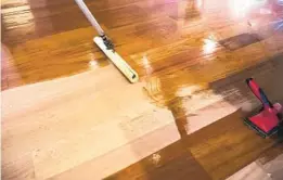  ?? GETTY IMAGES ?? Experts recommend refinishin­g hardwood floors every 10 to 15 years. The process is disruptive because it requires emptying out the rooms that need to be worked on.