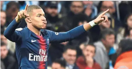  ??  ?? Redemption time: Paris St Germain’s Kylian Mbappe celebratin­g after scoring a goal during the French Ligue match against Marseille on Sunday. — AFP