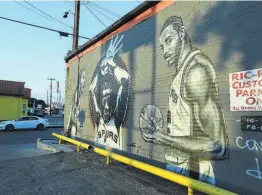  ?? Photos by Kin Man Hui / San Antonio Express-News ?? Three faces of Kawhi Leonard are displayed on this mural on the wall at Franky Diablos on the South Side.