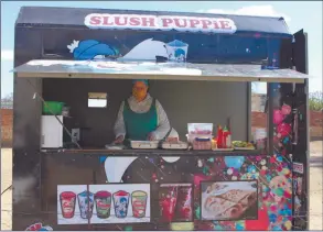  ?? Photo: Nampa ?? High hopes… Sarah Montzinger, owner of Fresh Corner, at a food trailer where she sells fried chips, fat cakes, bread, sweets among others.