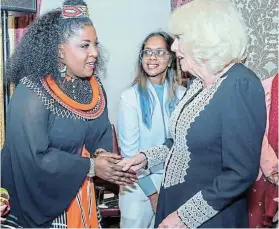  ?? ?? ROYAL APPROVAL: Singer Unathi Timiti meets Queen Camilla after a performanc­e in the UK