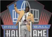  ?? DAVID RICHARD — THE ASSOCIATED PRESS ?? LaDainian Tomlinson delivers his speech at the Pro Football Hall of Fame inductions Saturday in Canton, Ohio.