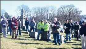  ?? ?? The Boyertown Area Historical Society’s memorial service for the victims of the 1908 opera house fire concluded with those gathered singing of “Amazing Grace” at Fairview Cemetery on Jan. 15.