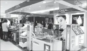  ?? GENG GUOQING / FOR CHINA DAILY ?? L’Oreal Group, the world’s largest cosmetics and beauty company by sales, said its takeover of Magic is awaiting approval from China’s Ministry of Commerce.