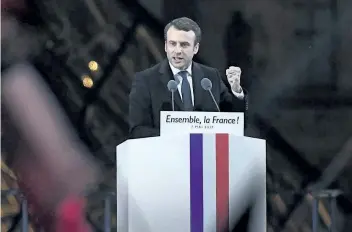  ?? DAVID RAMOS/GETTY IMAGES ?? Leader of ‘En Marche !’ Emmanuel Macron addresses supporters at The Louvre after winning the French presidenti­al election on Sunday in Paris, France. Pro-EU centrist Macron is the next president of France after defeating far right rival Marine Le Pen...