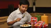  ??  ?? JUAN Romulo Riel Reyes of Zamora Elementary School making Magnolia Pancakes for mommy and siblings for sweeter and fluffier after school treats.